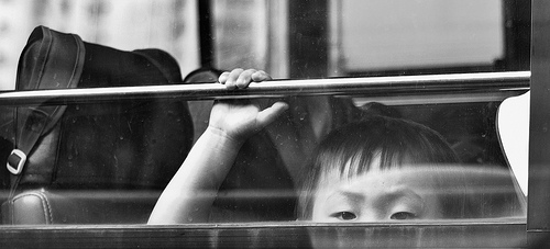 Asian-boy-bus-banner-ROSS-HONG-KONG-Flickr-BYNCSA